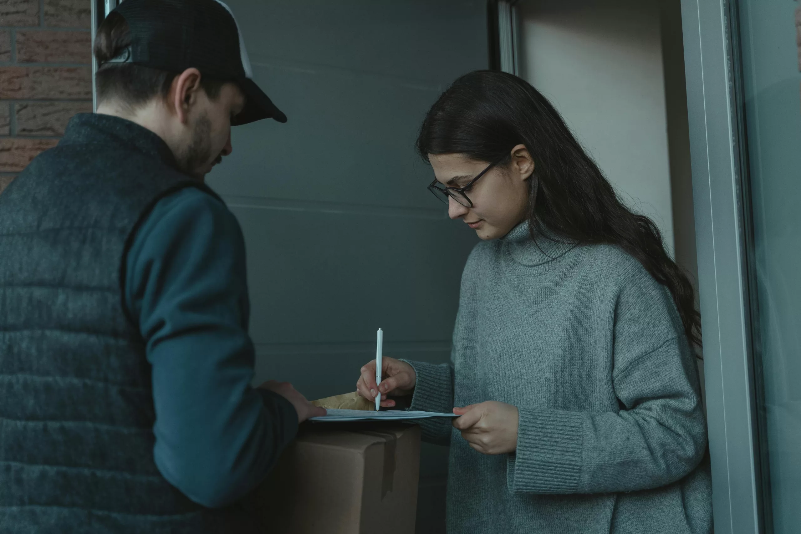 Express same day delivery team handling urgent business parcels