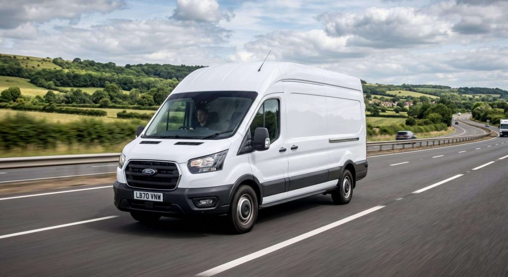 White long-wheelbase van on a UK motorway representing Nationwide Logistix’s fast, reliable same day delivery and courier logistics services across the country.